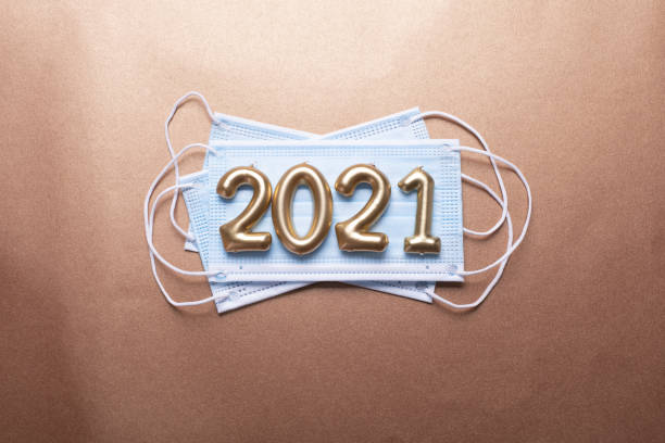 istock New year 2021 with face mask 1281903757