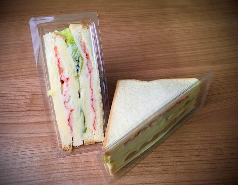 Delicious Freshly Club Sandwiches or Clubhouse Sandwiches with Imitation Crab Sticks and Sausage.