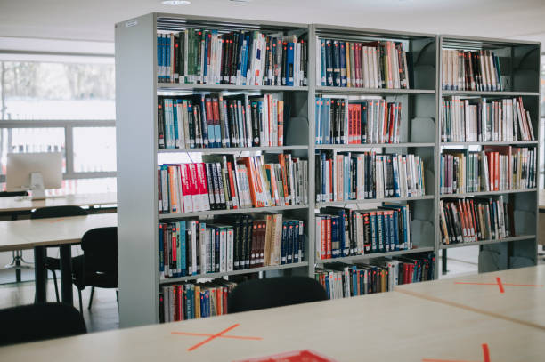 istock empty college library with cross sign social distancing 1281913415