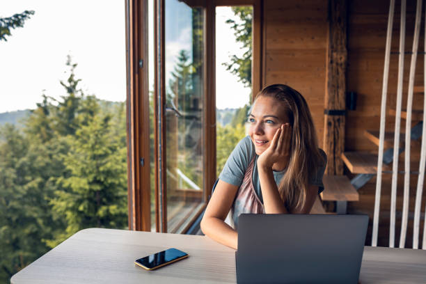 istock Young woman working from home 1281914371
