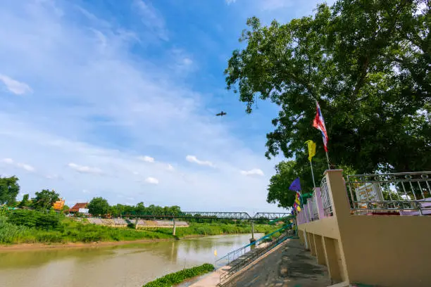 A pedestrian bridge over the Pa Sak River at Satue Temple, Ayutthaya Province in Thailand