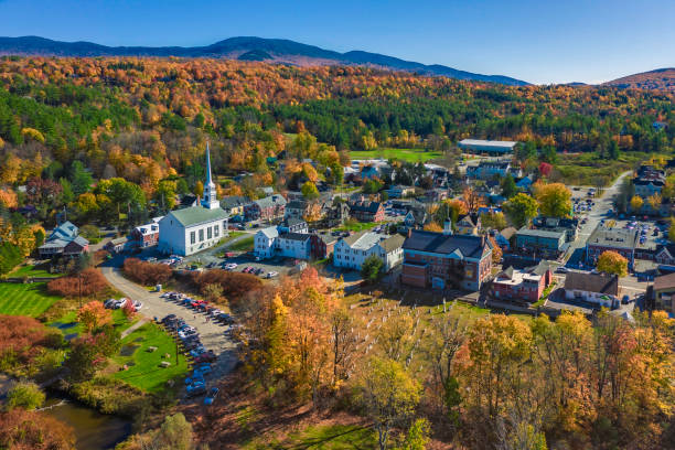 Aerial view of charming small town Stowe in Vermont Aerial view of charming small town Stowe in Vermont. Mountains with fall multicolor trees new england usa photos stock pictures, royalty-free photos & images