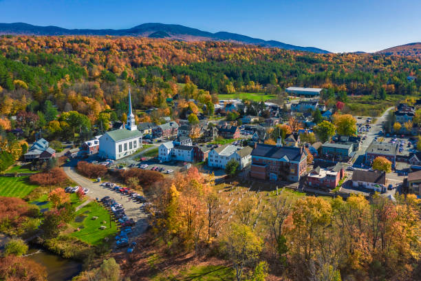 Aerial view of charming small town Stowe in Vermont Aerial view of charming small town Stowe in Vermont. Mountains with fall multicolor trees rural main street stock pictures, royalty-free photos & images