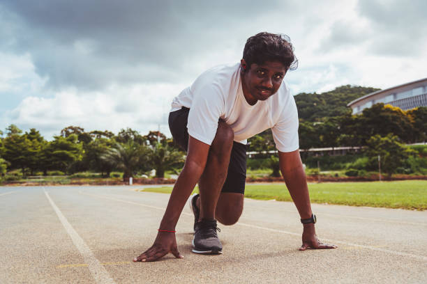 istock sport runner black man wear feet shoe active ready to start running 1281919311