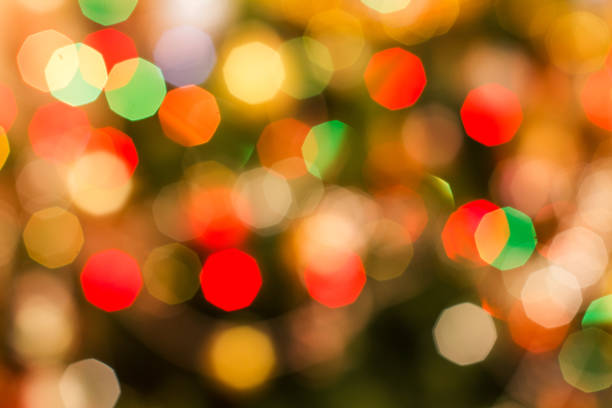 istock Christmas blurred background with colorful festive lights. 1281919489