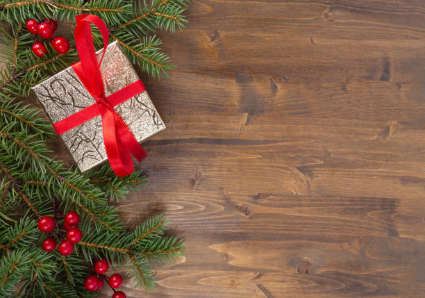istock Christmas background with fir tree and gift. Top view with copy space 1281920157