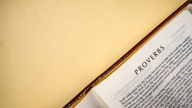 istock Open pages of the bible background (book of Proverbs) 1281923940