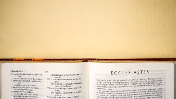 istock Open pages of the bible background (book of Ecclesiastes) 1281924036