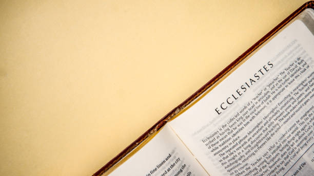 istock Open pages of the bible background (book of Ecclesiastes) 1281924415