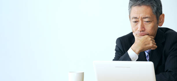 istock Thoughtful middle aged businessman in office. 1281924700