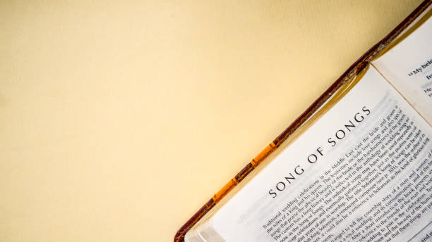 istock Open pages of the bible background (book of song of songs) 1281924735