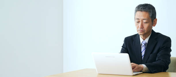 istock Depressed middle aged businessman in office. 1281924761