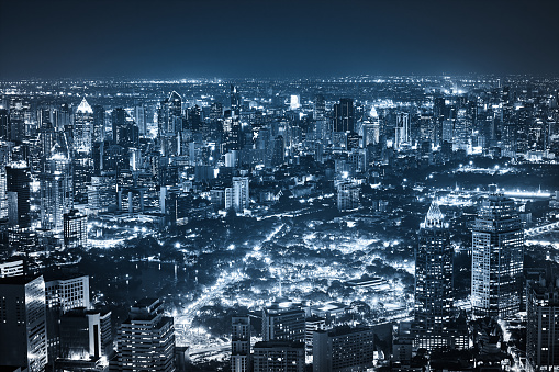 scenic of night cityscape with blue light tone for communication concept