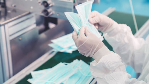 istock Face mask production line in modern factory 1281928435