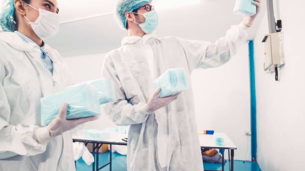 istock Face mask production line in modern factory 1281928504