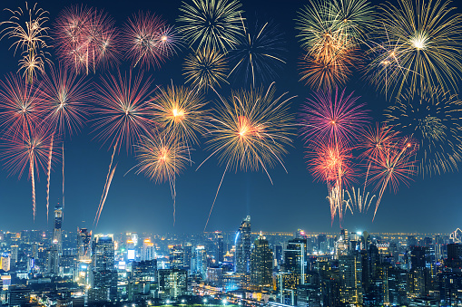 New Year multicolor fireworks celebration in Bangkok city skyline in night time