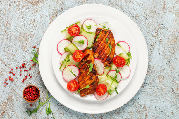 istock Chicken and fresh vegetable salad 1281931110