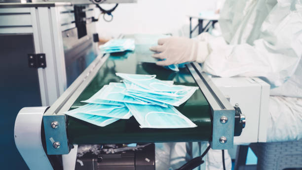 istock Face mask production line in modern factory 1281931261