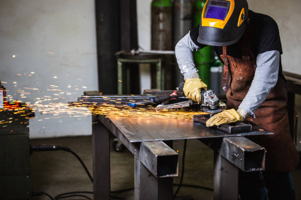 istock Metal Worker with the grinder 1281932252
