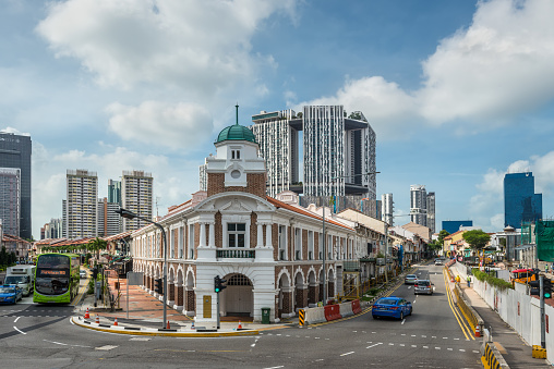 Singapore - December 4, 2019: Street scene in Chinatown Singapore at sunny day with historical local house in Singapore's old heritage Chinatown.