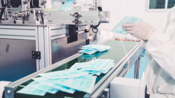 istock Face mask production line in modern factory 1281933241