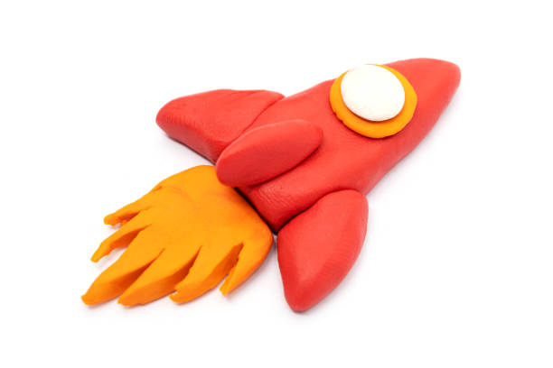 istock Play dough Rocket on white background. Icon rocket. Handmade clay plasticine 1281934756