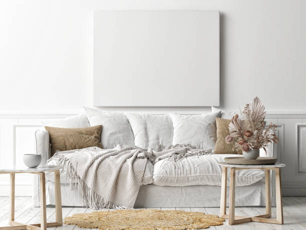 istock Mockup poster frame on the wall, white sofa in Scandinavian Livingroom 1281935519