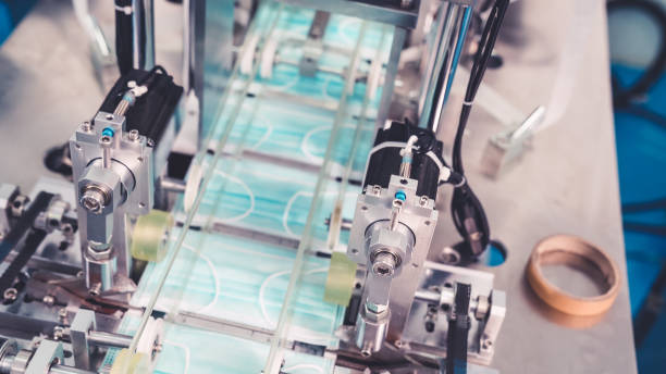 istock Face mask production line in modern factory 1281935652