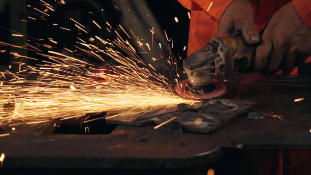 istock Professional mechanic is cutting steel metal. 1281935827