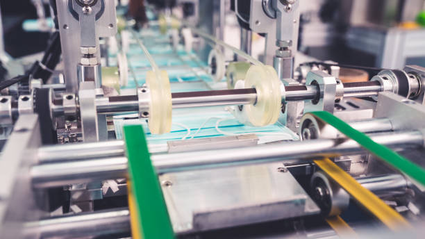 istock Face mask production line in modern factory 1281936396
