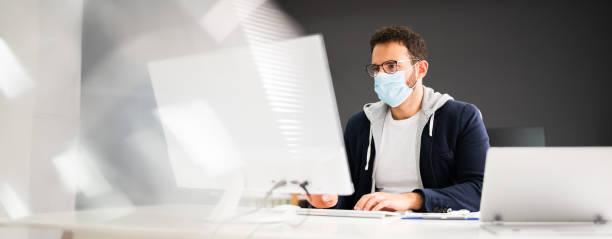 istock Business Employee Wearing Face Mask 1281940109