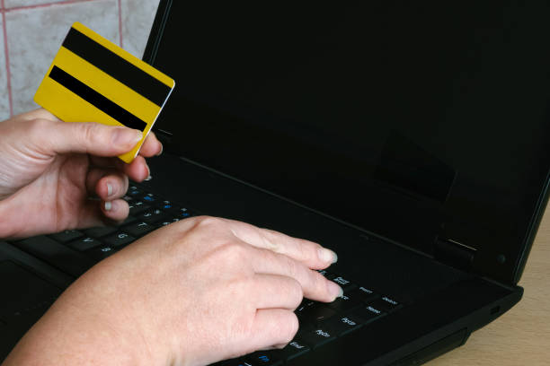 istock Hand Holding Credit Card 1281942047