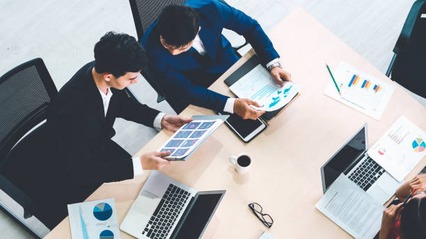 istock Business people group meeting shot from top view 1281942844