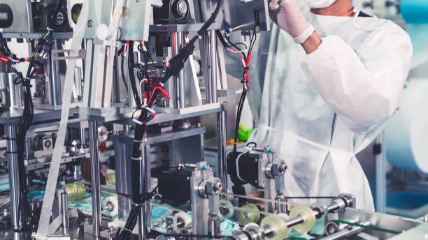 istock Face mask production line in modern factory 1281943062