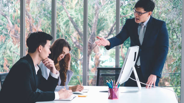 istock Angry business person dispute work problem in group meeting 1281945521