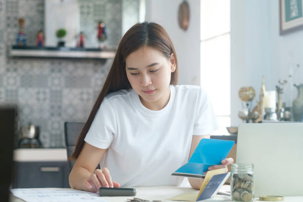 istock Attractive young Asia woman working at home. 1281945587