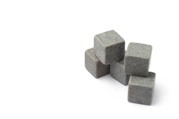 istock Whiskey stones on a white background close-up, isolate, place for text. 1281945687