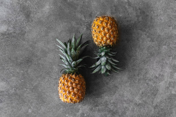istock Pineapple on a stone table. Tropical Fruits. 1281947269