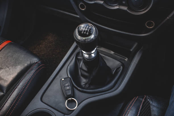 istock automatic transmission shift selector in the car interior. Closeup a manual shift of modern car gear shifter. 1281951765