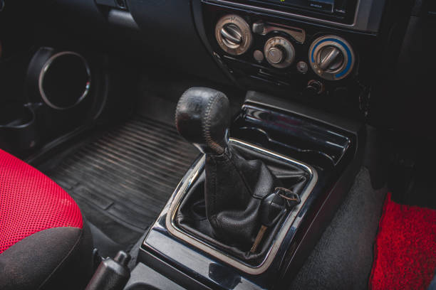 istock automatic transmission shift selector in the car interior. Closeup a manual shift of modern car gear shifter. 1281951770