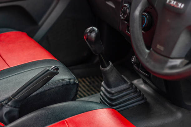 istock automatic transmission shift selector in the car interior. Closeup a manual shift of modern car gear shifter. 1281951785