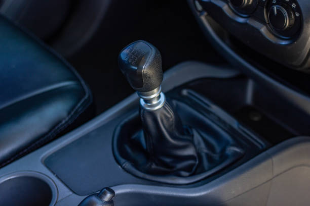 istock automatic transmission shift selector in the car interior. Closeup a manual shift of modern car gear shifter. 1281951830