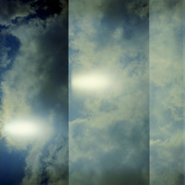 istock Grunge image of sky with a cloud on grainy film texture 1281953229