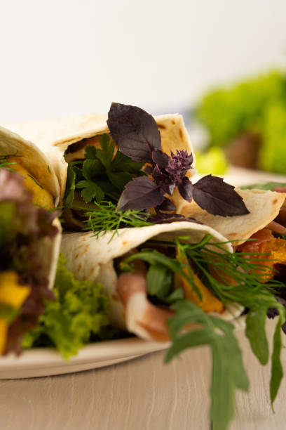istock Salad with arugula, pumpkin, prosciutto and parmesan 1281954286