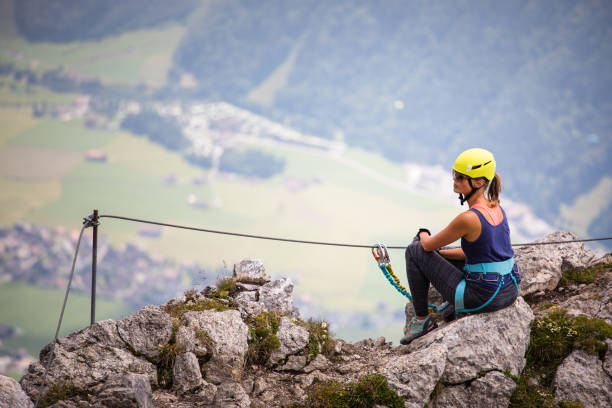 istock Pretty, female climber on a via ferrata 1281956289