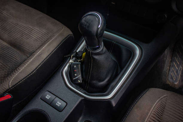 istock automatic transmission shift selector in the car interior. Closeup a manual shift of modern car gear sifter. 1281957551