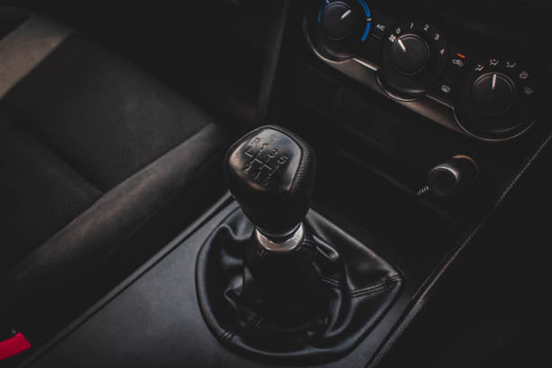 istock automatic transmission shift selector in the car interior. Closeup a manual shift of modern car gear sifter. 1281957635