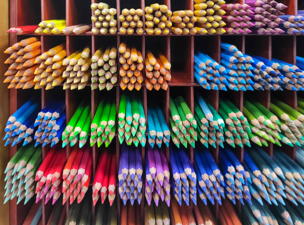 istock Wooden colored pensils on shelf 1281959481