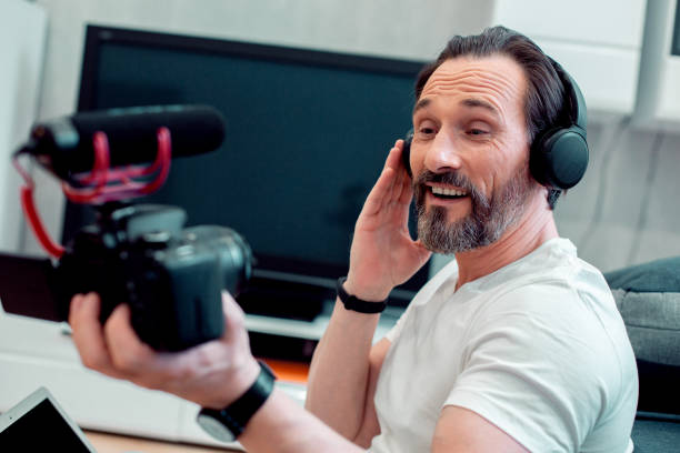 istock Attractive man advertising his new sound system 1281960522