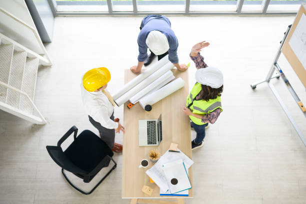 istock Top view of engineering people are meeting , Engineering people, corporate working, teamwork concept. 1281960631